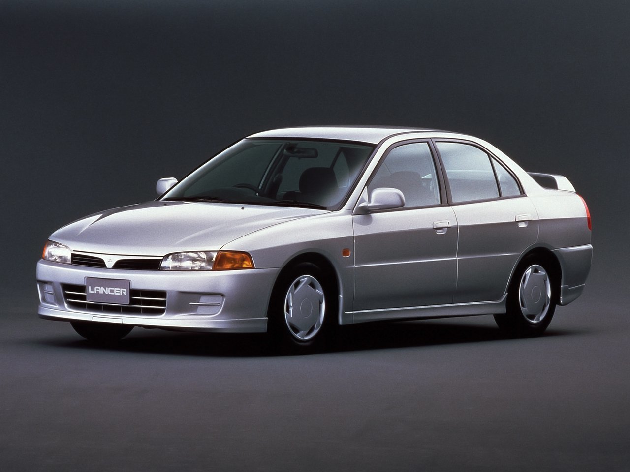 Подбор шин и дисков для автомобиля Mitsubishi Lancer